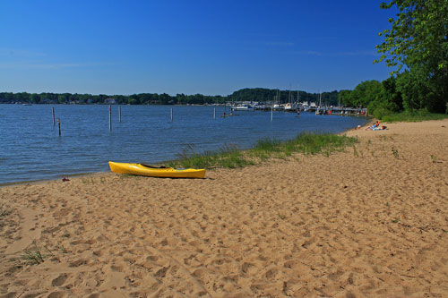 lake macatawa beach in front of mac boat house